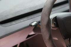 ABS moulded stalk cover installed on the steering column stalk of Model Y