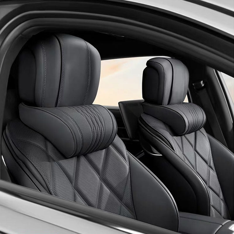 Black Nappa leather neck and lumbar support pillows fitted inside the vehicle cabin