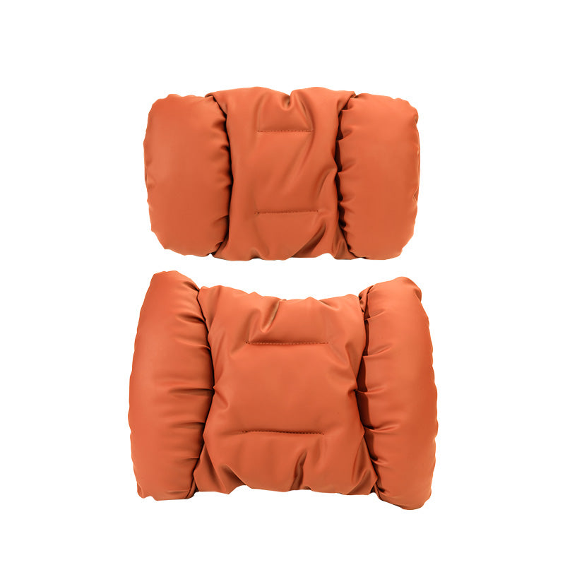 Dark colour options for the Nappa leather neck and lumbar support pillow