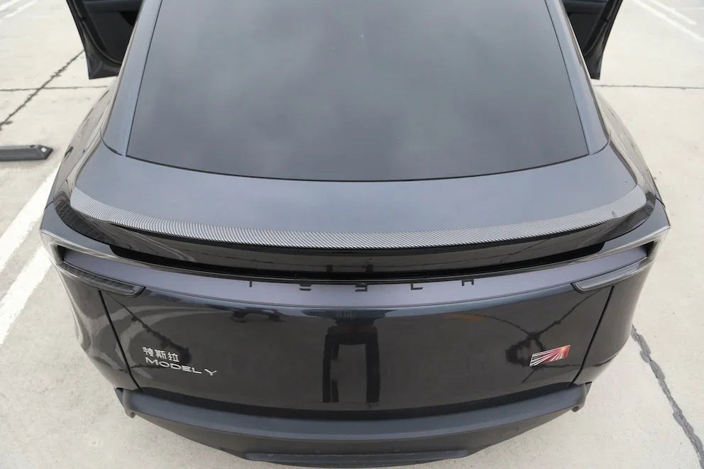 Rear view of the performance spoiler installed on Model Y (2025–2026)