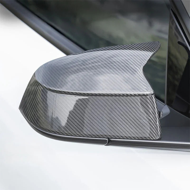 Close-up of the installed rear view mirror cover on Model Y