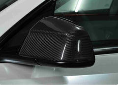 Real carbon fibre rear view mirror covers installed on Model Y (2025–2026)