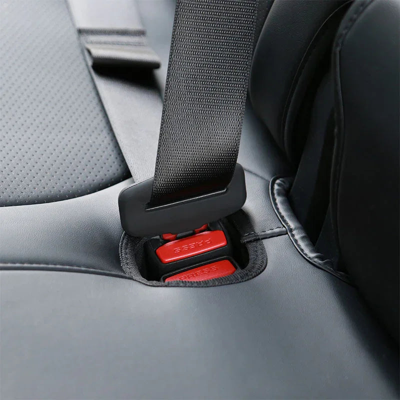 Close-up of the silicone rear seatbelt buckle cover installed on the rear seat