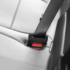 Silicone rear seatbelt buckle cover fitted to the right rear seat buckle