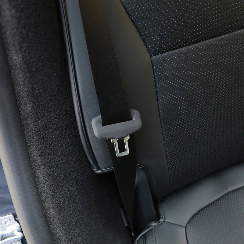 Rear seatbelt buckle cover allowing normal seatbelt operation after installation