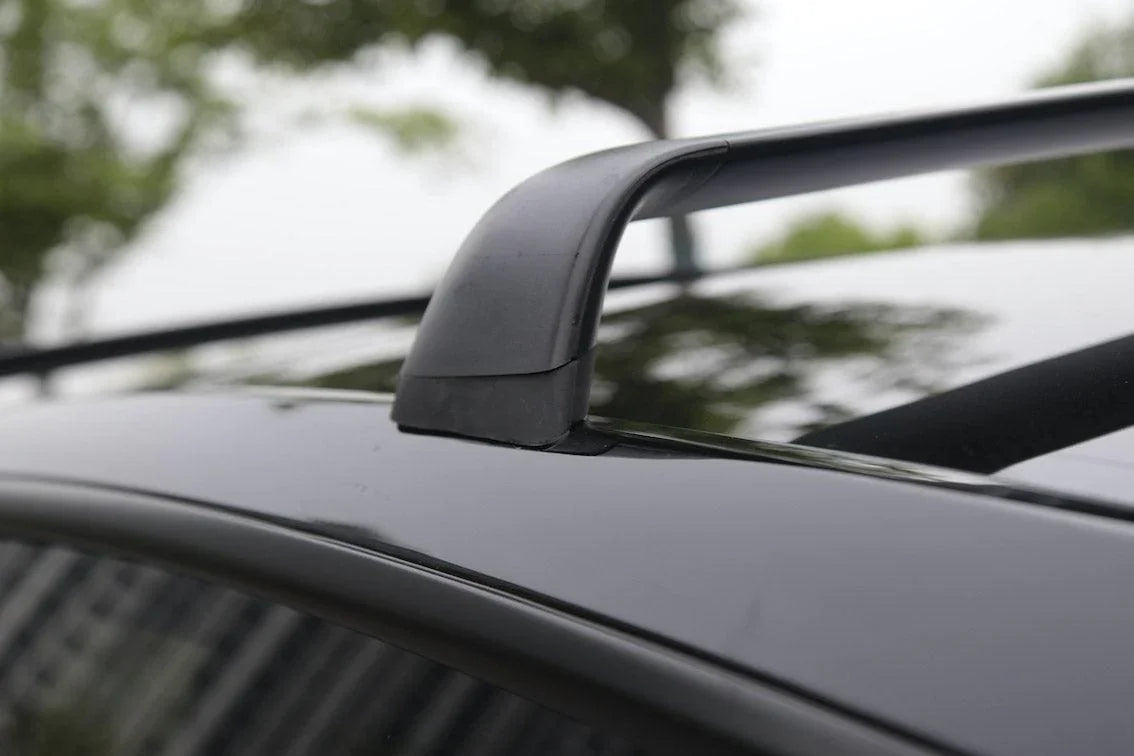 Close-up of the roof rack cross bar mounted on Model Y