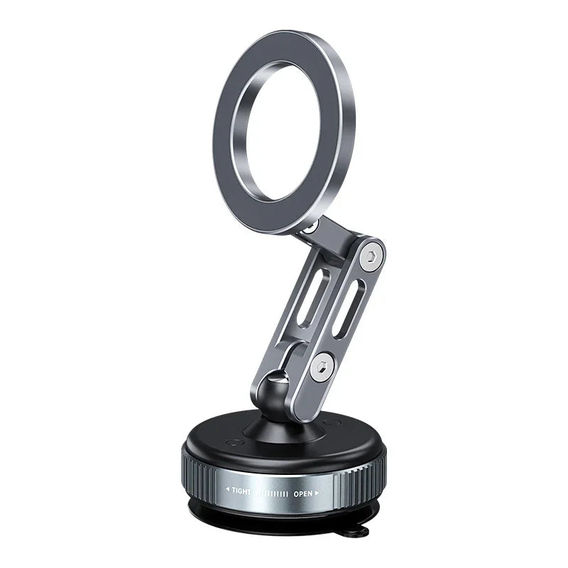 Rotatable magnetic dash phone holder mounted on a vehicle dashboard