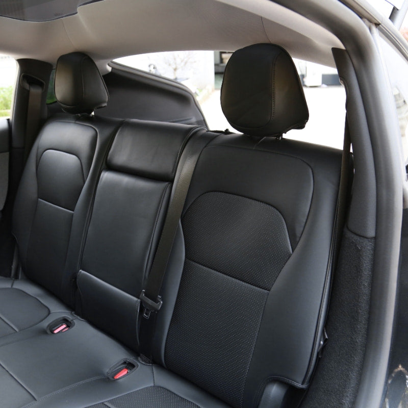 Black microfibre leather rear seat covers installed on Model Y (2025–2026)