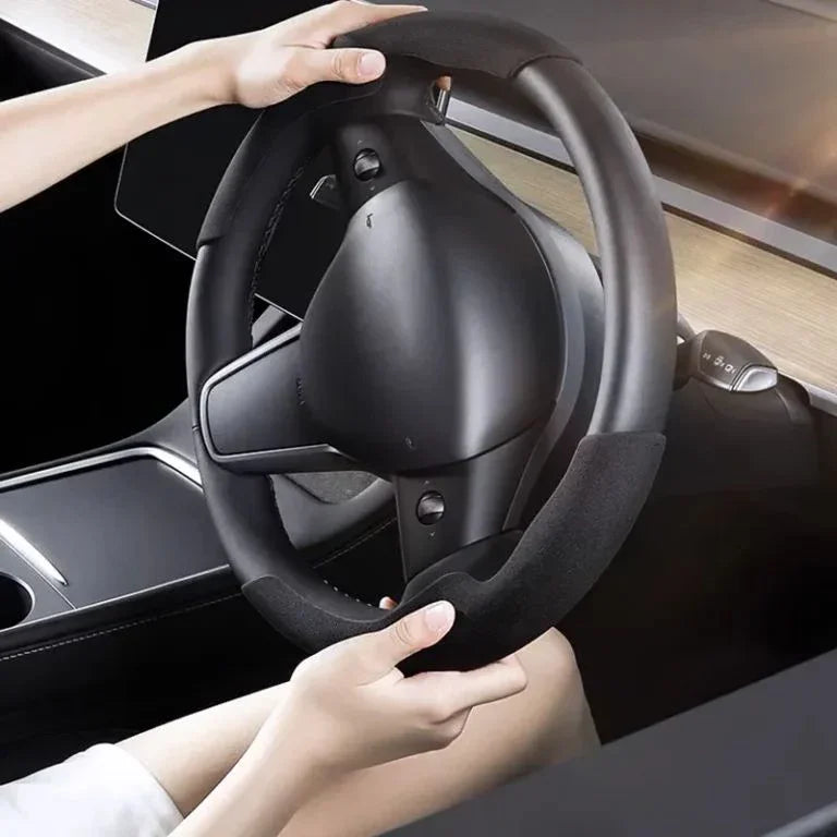 Steering wheel grip grab cover installed on Model Y and Model 3