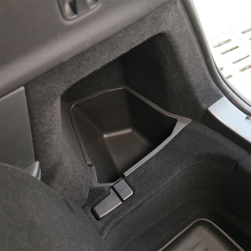 Right side trunk storage box fitted into the cargo side compartment of Model Y L