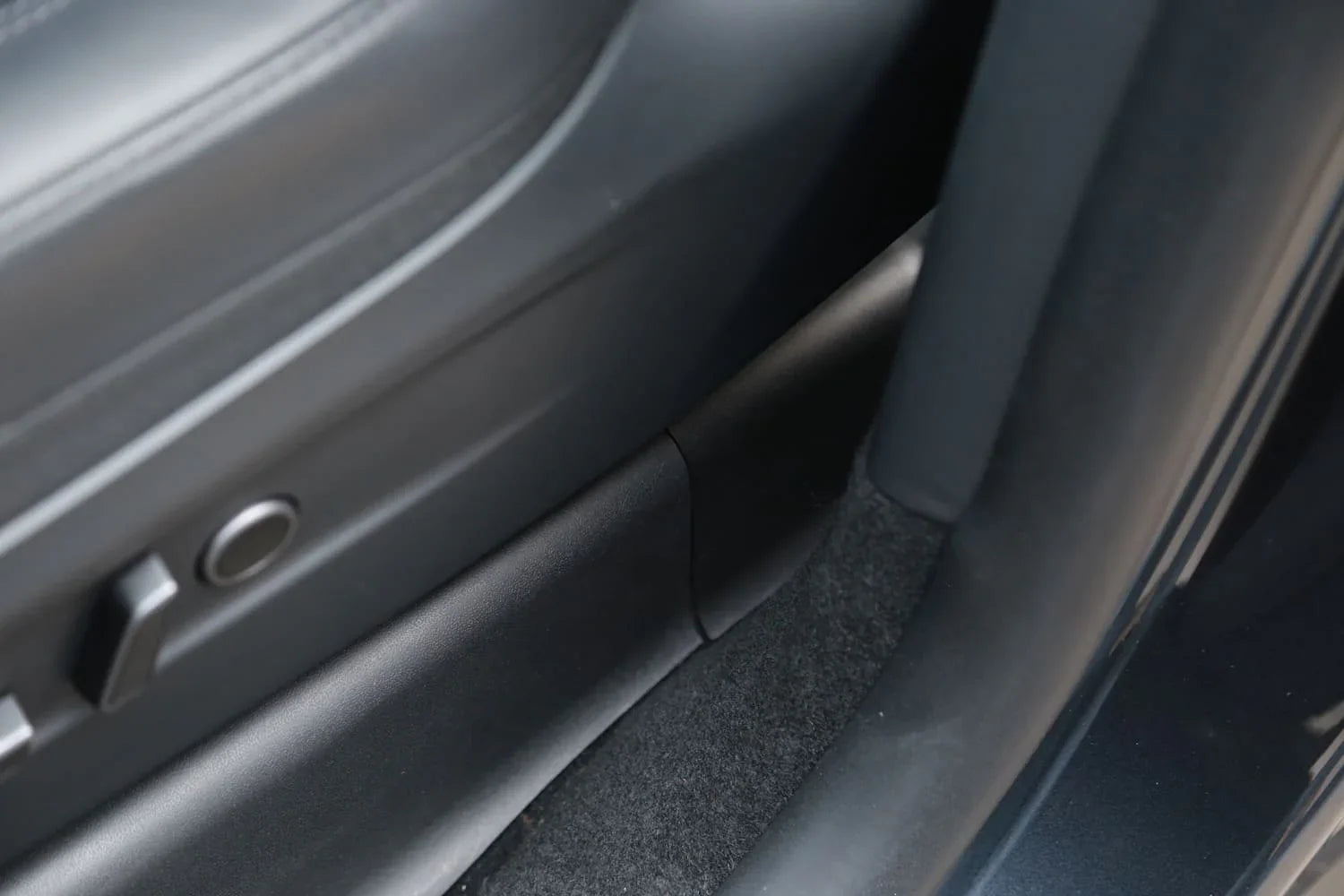 Close-up of the installed under seat carpet protector