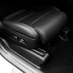 Driver side under seat carpet protector installed in Model Y L