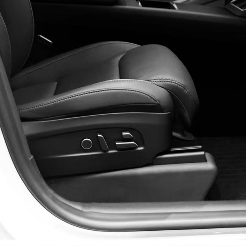 Passenger side under seat carpet protector installed in Model Y L