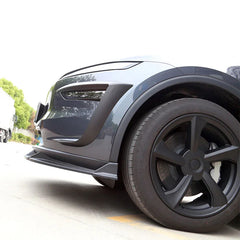 Side view of the wind deflector headlight trim installed on Model Y