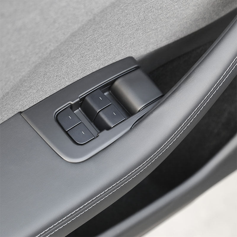 Close-up of the Matt Black ABS window lift switch button cover on Model 3