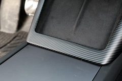 Close-up of the carbon fibre wireless phone charger surround installed around the charging area