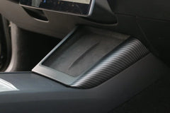 Carbon fibre wireless phone charger surround installed on Model 3 (2024–2026) and Model Y (2025–2026)