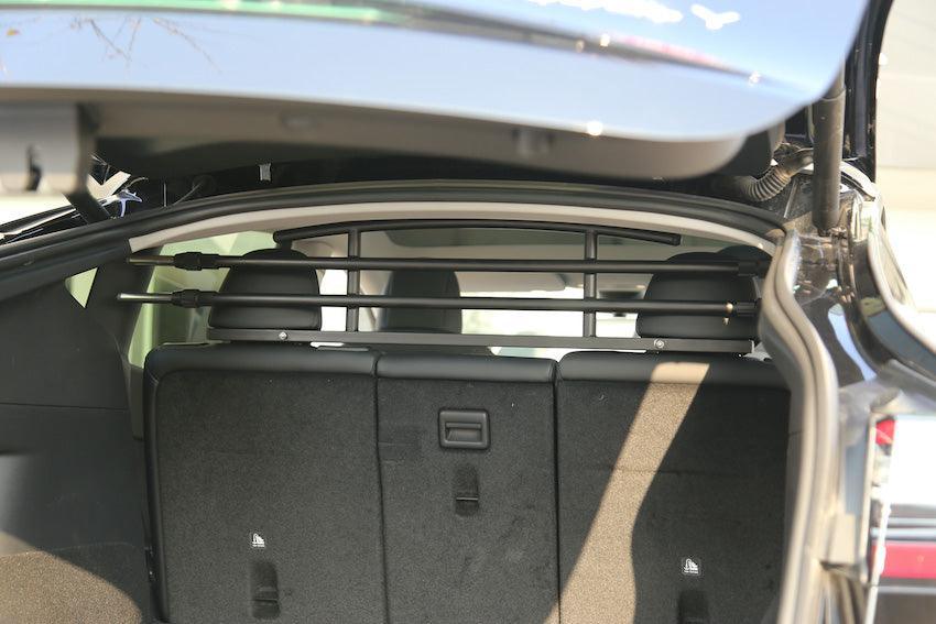 Rear view of the cargo and pet barrier installed in Model Y